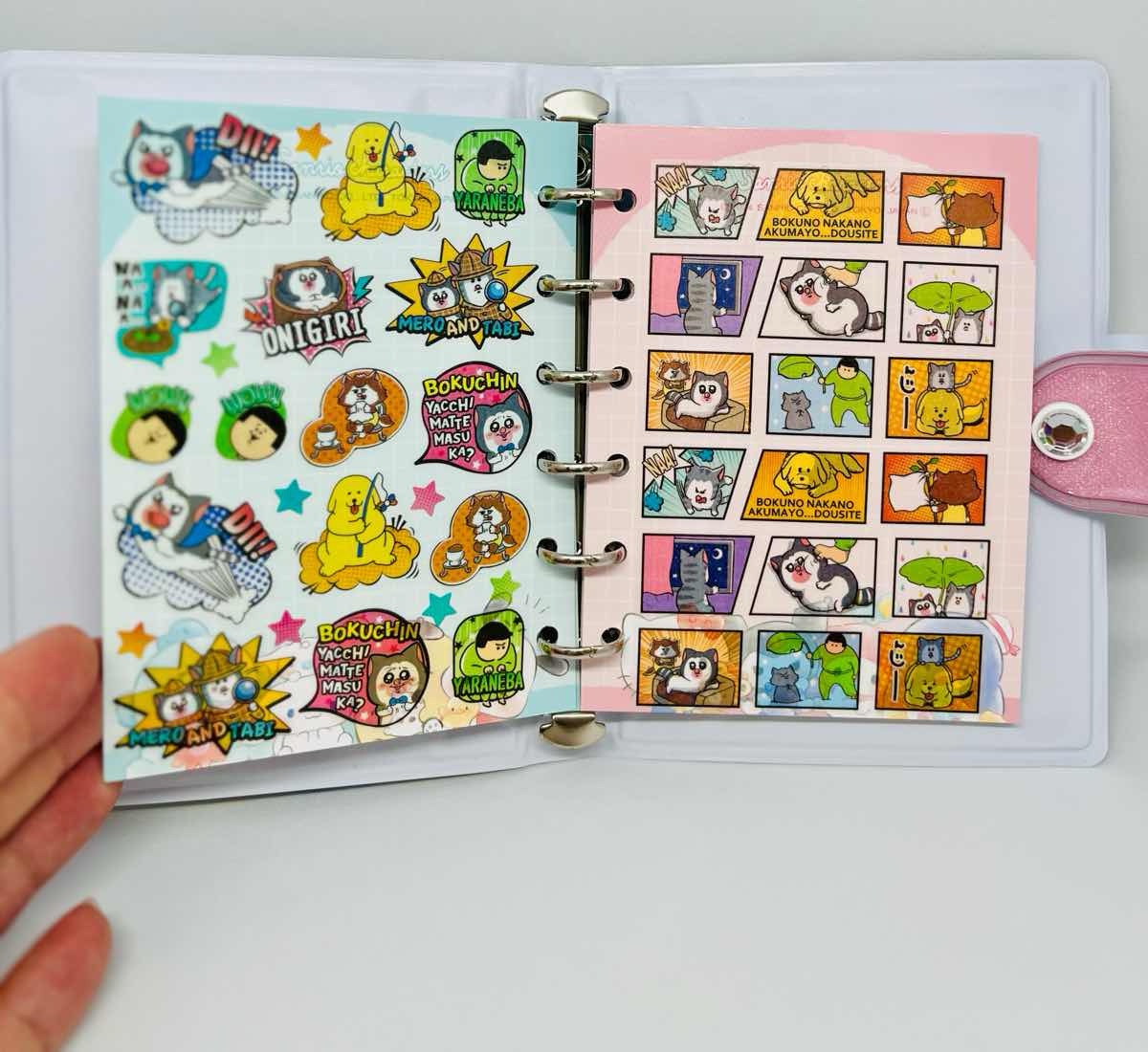 Open Japanese sticker album filled with colorful kawaii stickers / カラフルでかわいいシールが貼られた日本のシール帳